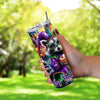 a person holding a cup with a raccoon on it